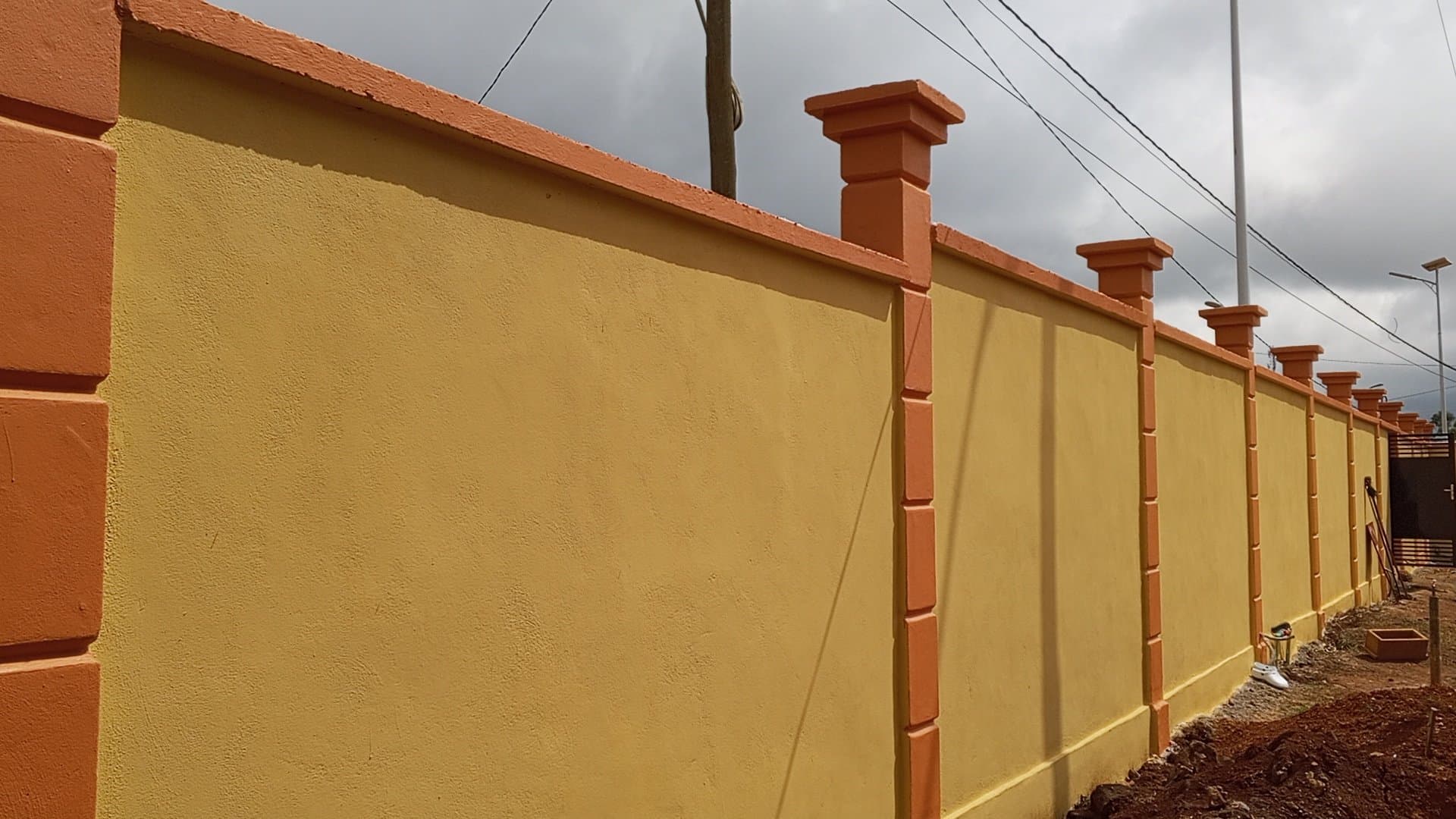 Dr. Tama Mumah Emmanuel and Family Donate U-Shaped Fence, Borehole, and Water Stand to Bamenda One Subdivisional Hospital